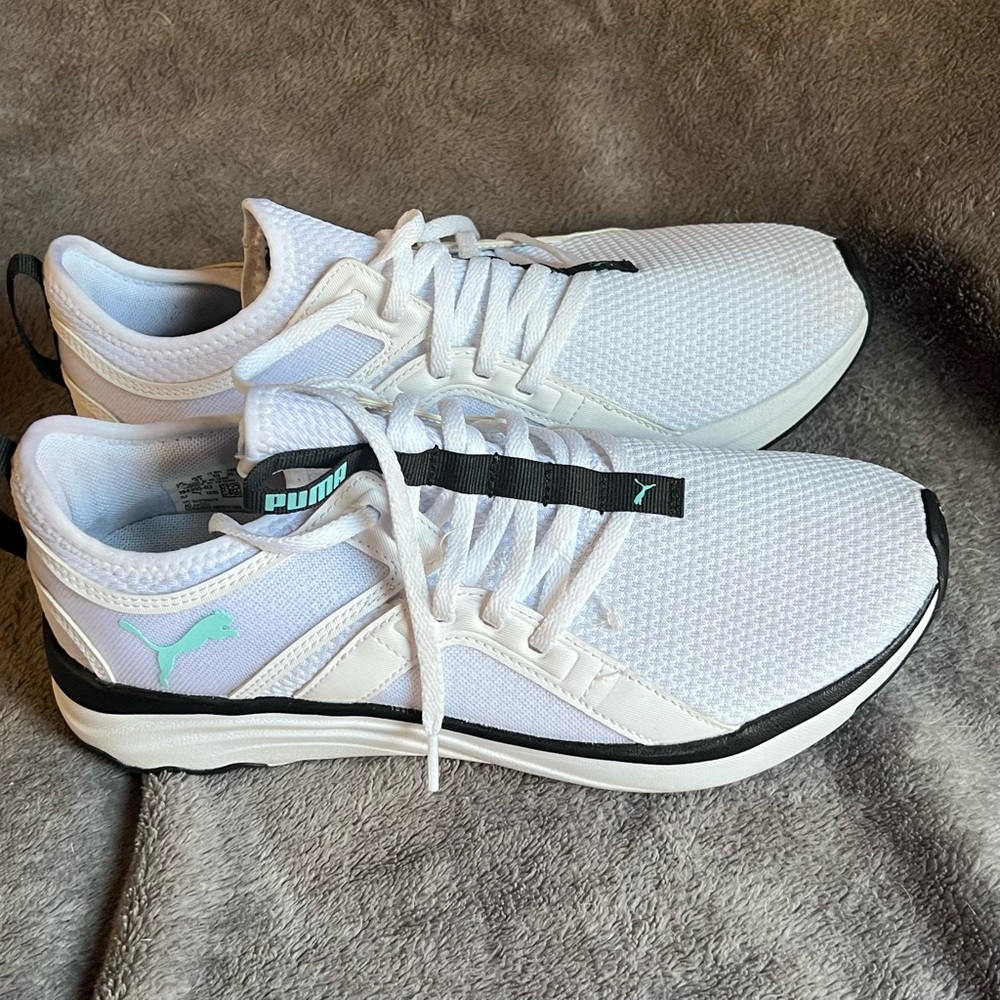 Puma women’s White and Black Athletic Shoes